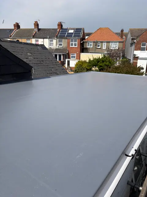 Broad clean fibreglass roof fills frame: grp fibreglass roof by LR Roofing near Weymouth, Dorset