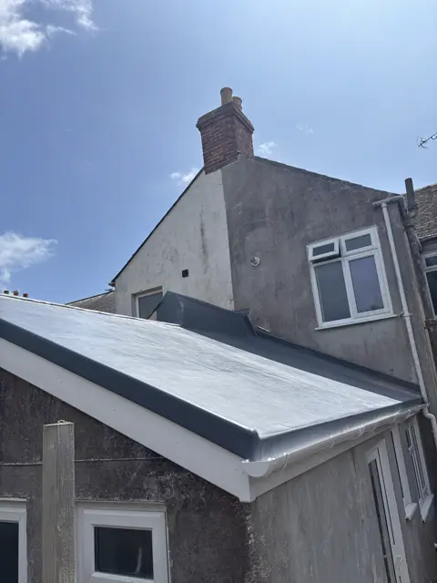 Neat fibreglass roof, trim and gutter: grp fibreglass roof by LR Roofing near Weymouth, Dorset